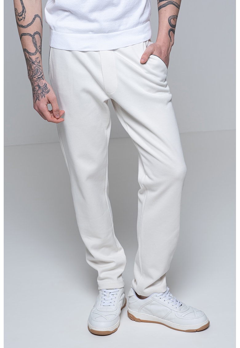 Oferte la Pantaloni de trening cu croiala conica - Alb fildes