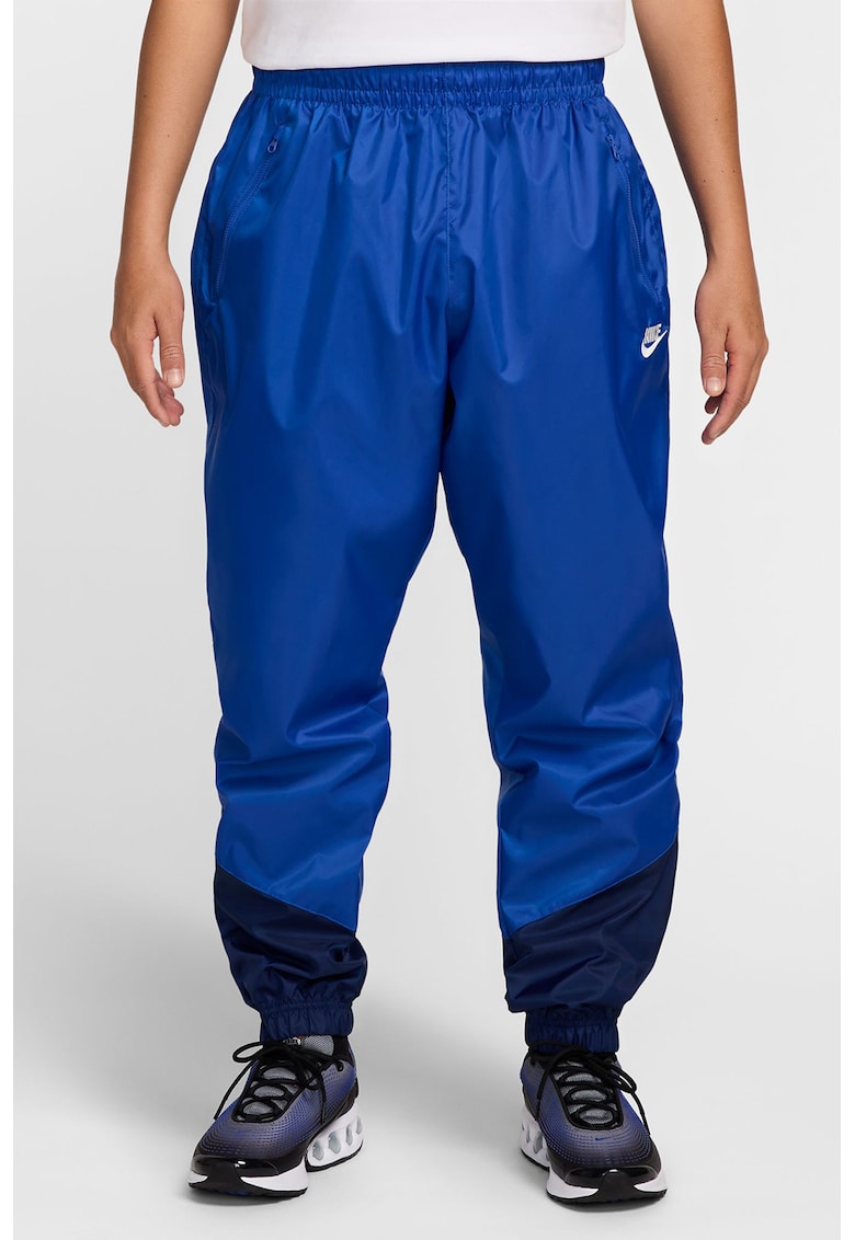 Pantaloni cu slituri cu fermoar la glezna Windrunner - Albastru royal/Bleumarin
