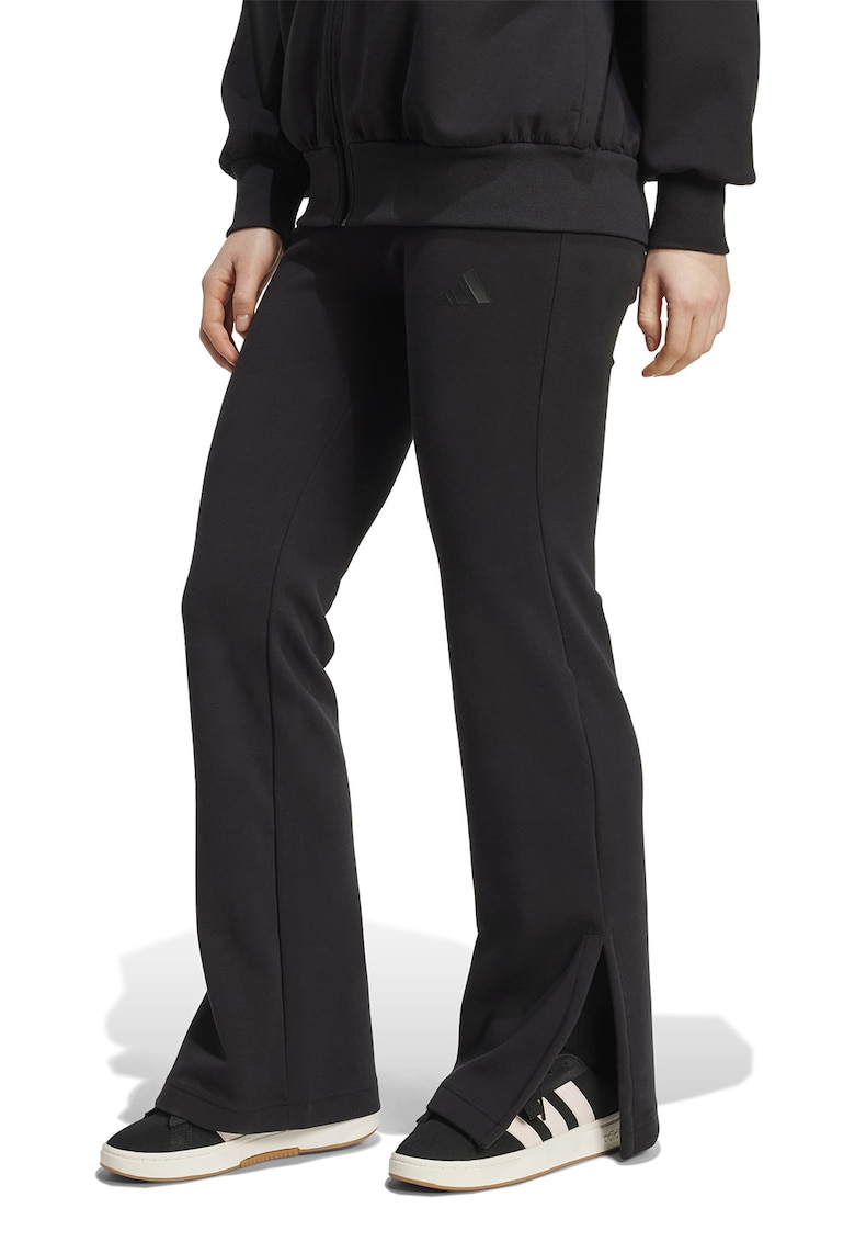 Pantaloni de trening cu croiala evazata si slituri la terminatie - Negru
