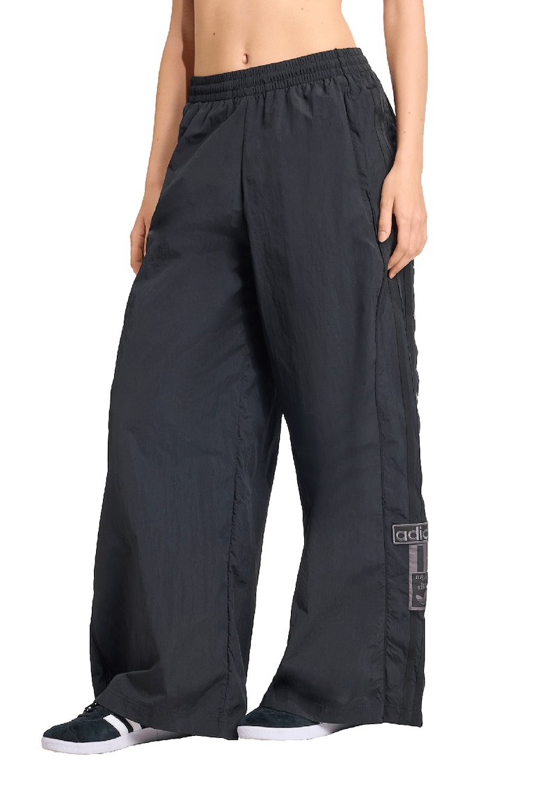 Pantaloni de trening cu croiala ampla si capse laterale - Negru