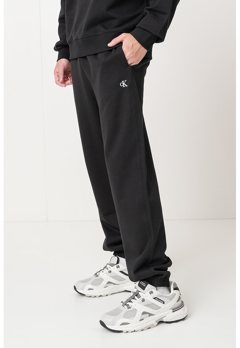 Pantaloni de trening relaxed fit cu terminatie elastica - Negru